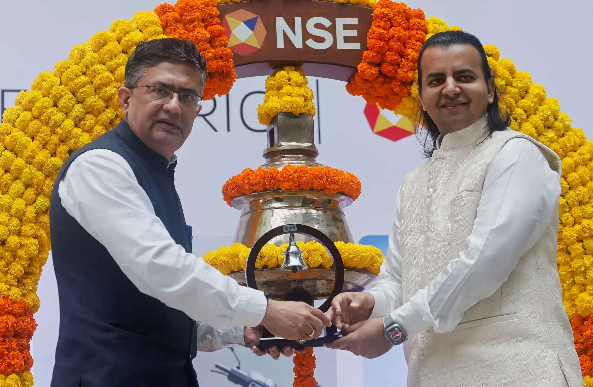 Ashish Chauhan MD and CEO of NSE Bhavish Aggarwal CEO of Ola ELECTRIC